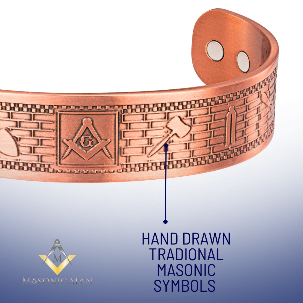 Side view of engraved Masonic copper bracelet displaying craftsmanship and tools of the Craft