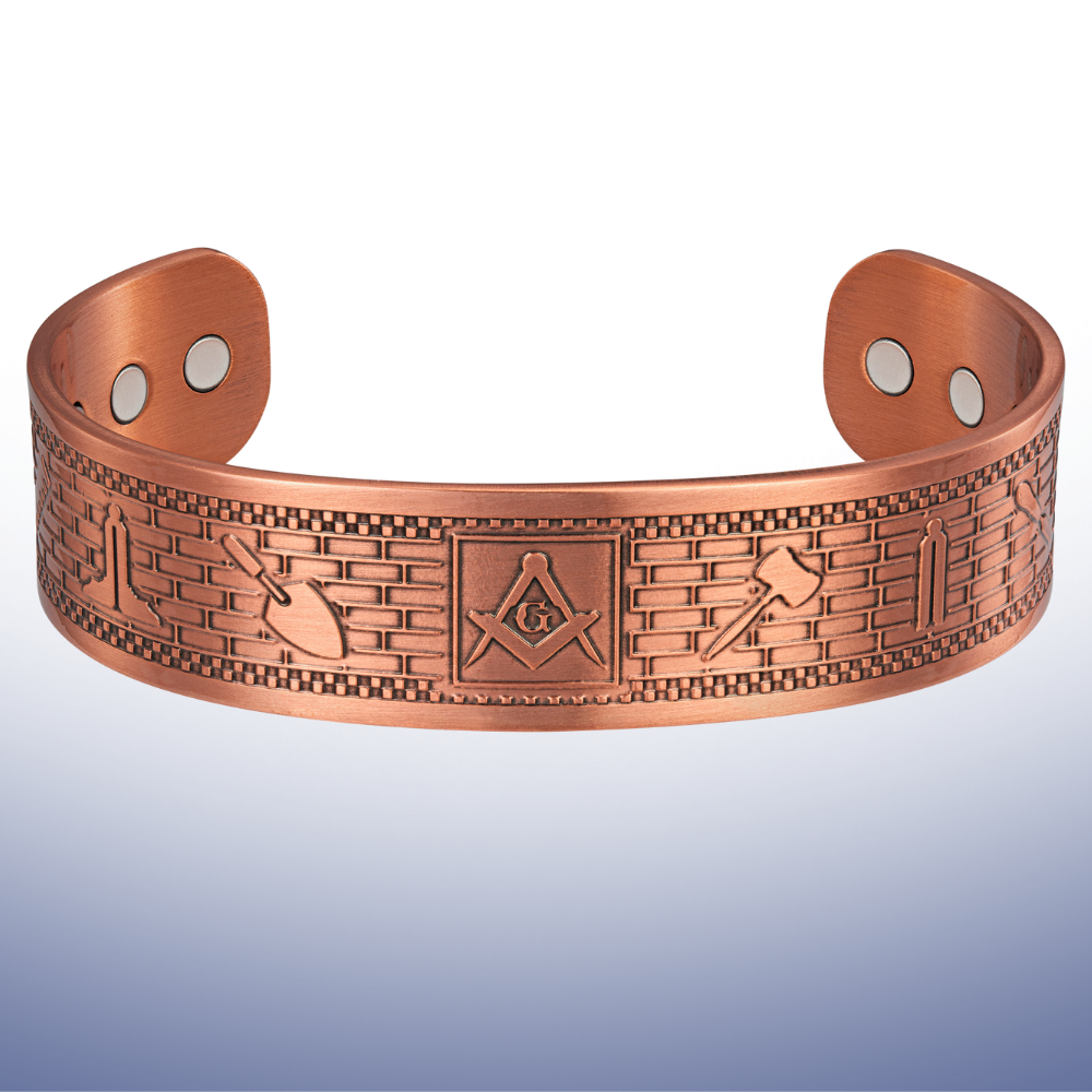 Copper Masonic bangle engraved with Square and Compasses and the Working Tools of a Freemason